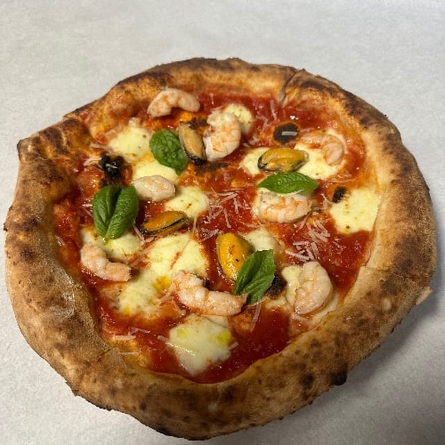 Pizza ai Frutti di Mare "Pizza Of The Sea".