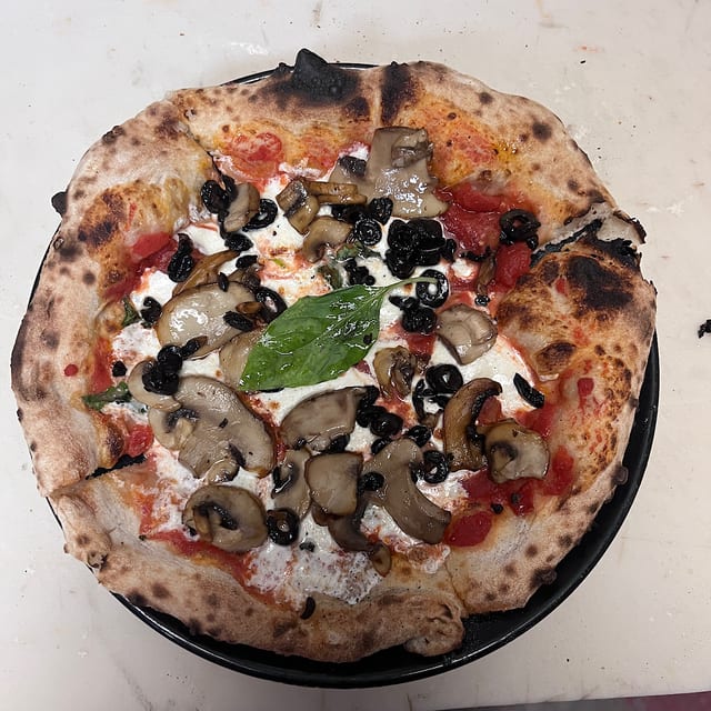 Pizza ai Funghi "Cheese Pizza With Mushroom".